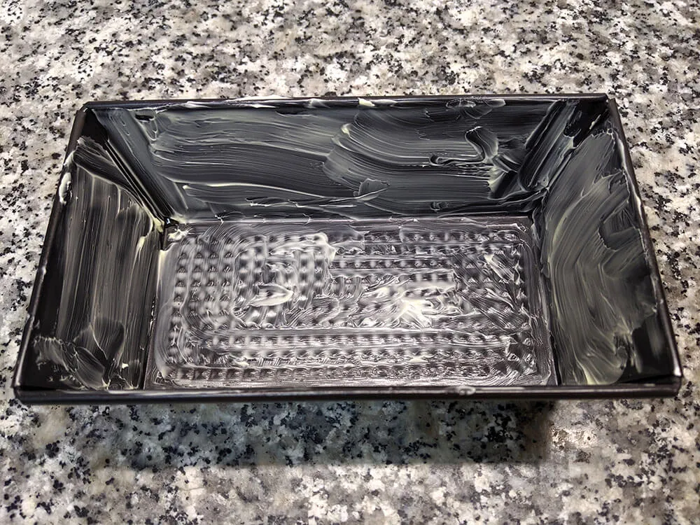 Molde untado con mantequilla.